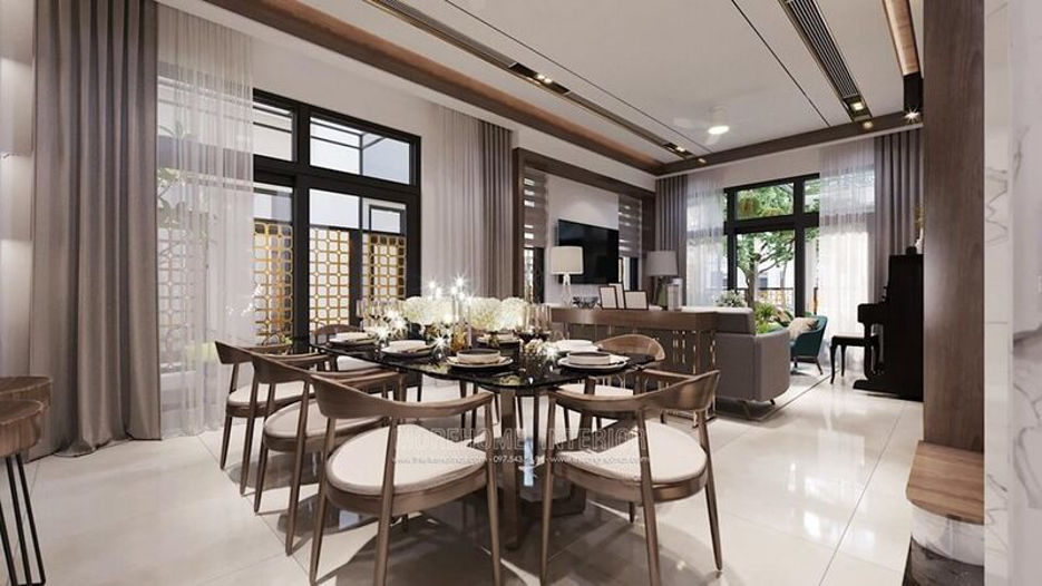 Bộ bàn ghế ăn biệt thự này được thiết kế và sản xuất vô cùng tinh tế, trau chuốt và sang trọng. Mặt bàn ăn được làm bằng đá nhân tạo màu đen, chân bàn là gỗ óc chó nhập khẩu cao cấp. 8 chiếc ghế ăn gỗ óc chó bọc đệm da màu kem kết nối tạo thành chiếc áo choàng bao quang chiếc bàn ăn hiện đại.